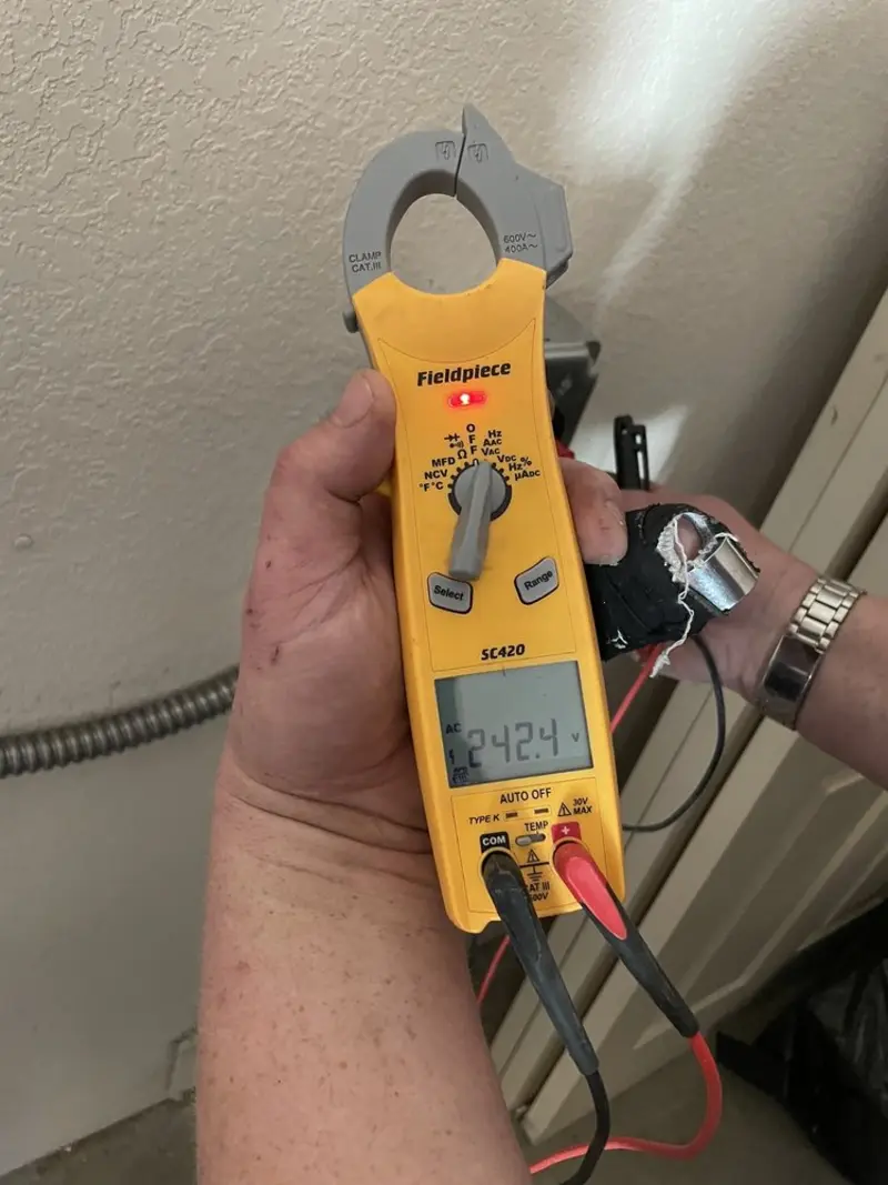 Voltage testing with clamp meter during Electrical Installation Services in Las Vegas